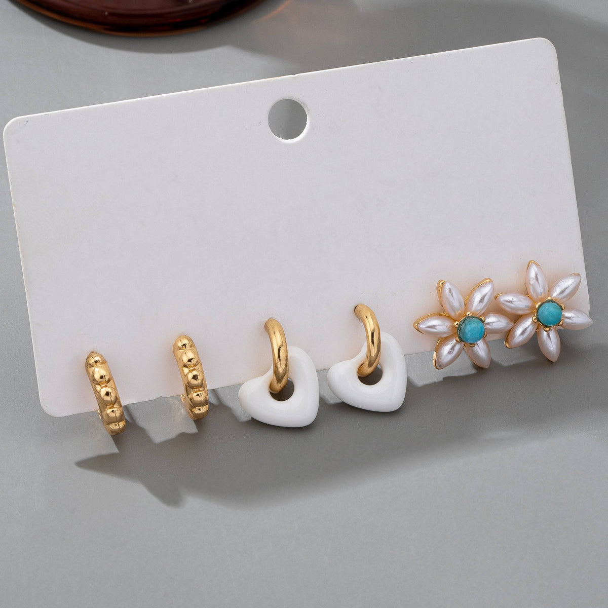 HUGGIE HOOP BALL FLORAL HEART TRIO EARRINGS