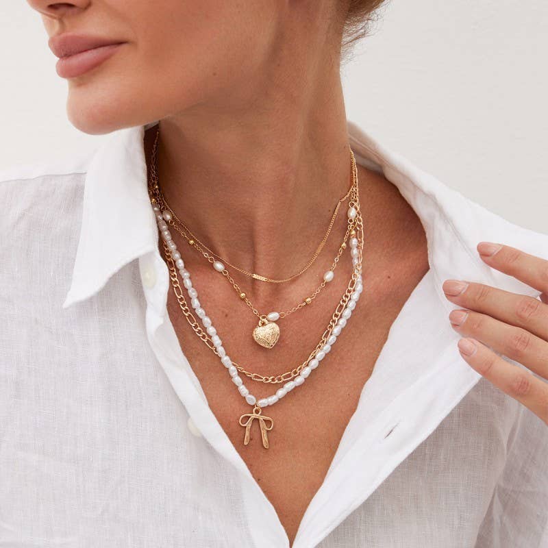 BEAUTIFUL BOW PEARL HEART PENDANT LAYERED NECKLACE