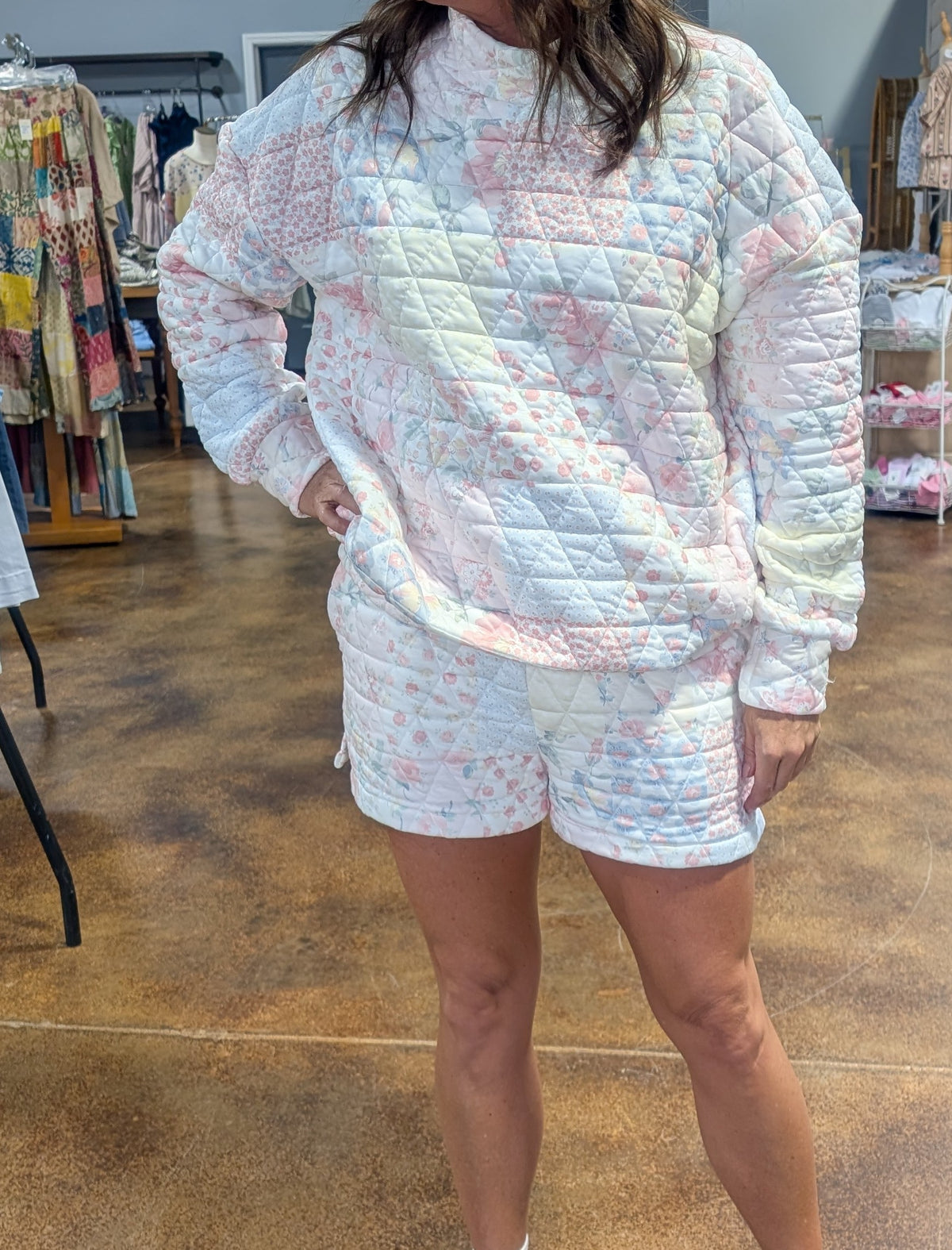 Floral textured mock neck sweater