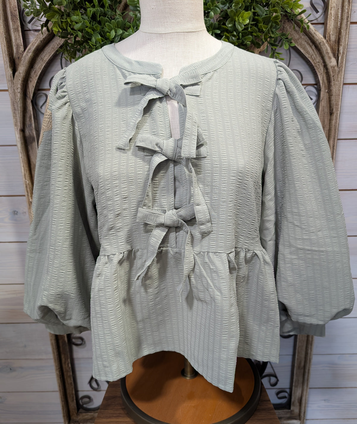 Sage Embroidered Peplum Top