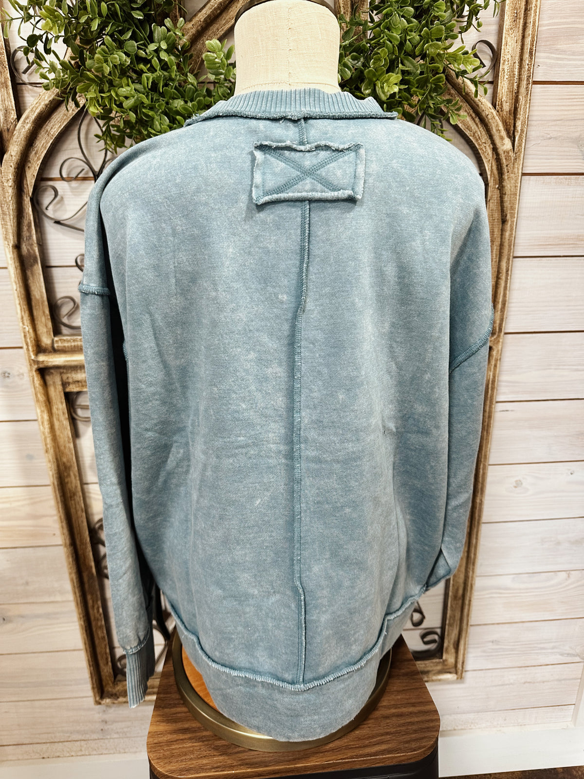 acid washed exposed seam fleece sweatshirt