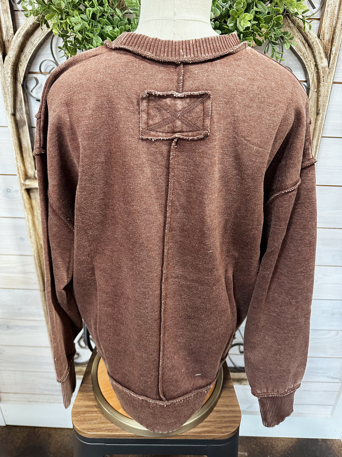acid washed exposed seam fleece sweatshirt