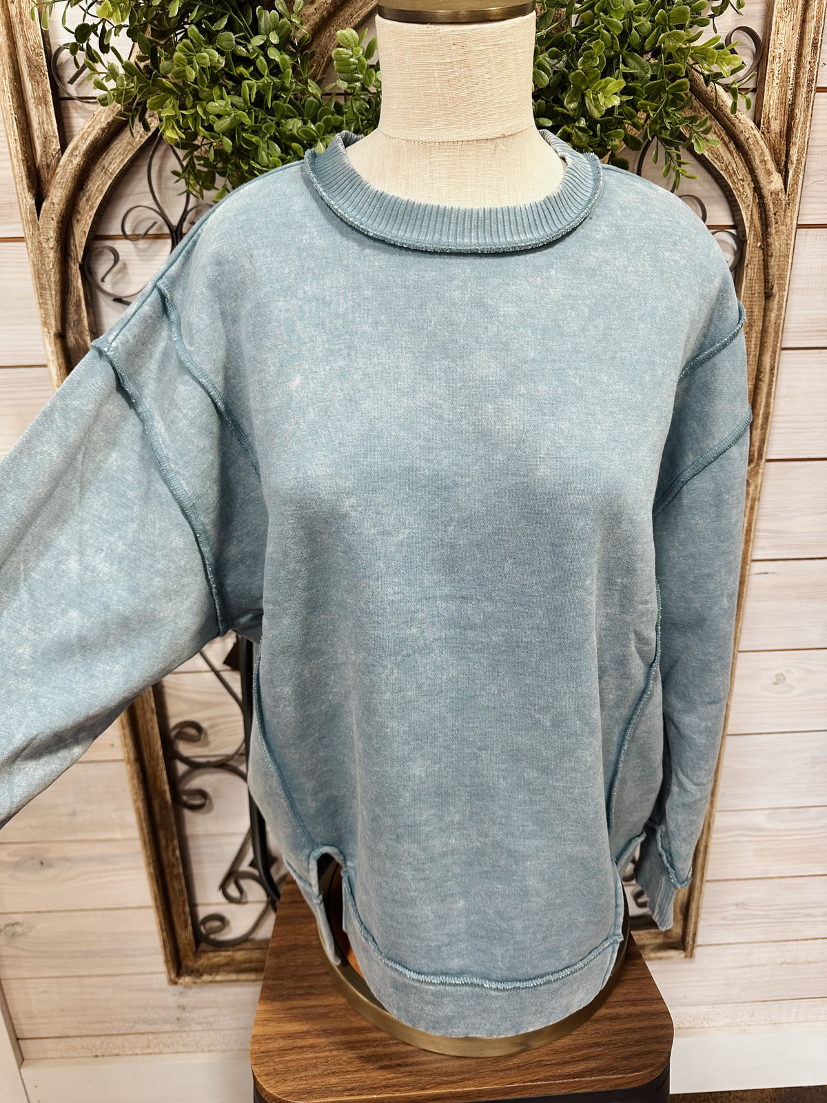acid washed exposed seam fleece sweatshirt